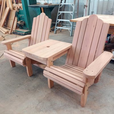 Adirondack Vignette Settee in Production (Options: Standard Width, Old-Growth Redwood, Standard Seat Depth, Rounded Corners, 2 in Umbrella Hole).