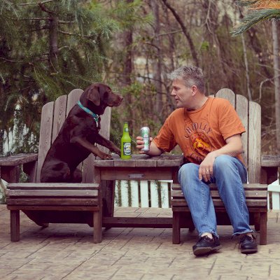 Adirondack Vignette Settee. Photo Courtesy of Magnus Rundqwist & Scout (the Chocolate Lab). Photo shows finish after 5 years out in the weather...