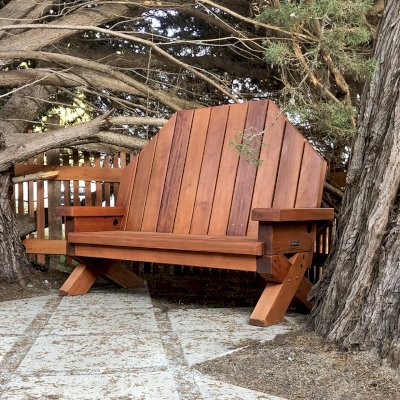 Custom Adirondack Wooden Loveseat (Options: California Redwood, No Cushions, No Ottoman, Transparent Premium Sealant). Photo Courtesy of O. Bowman of Sea Ranch, California.