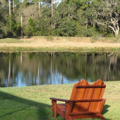 Adirondack Wooden Loveseat (Options: Old-Growth Redwood, Standard Seat Depth, No Cushion, No Ottoman, Transparent Premium Sealant). 