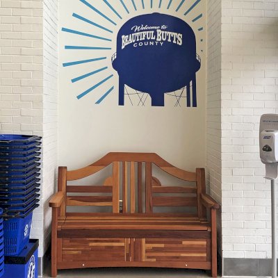 Alan's Redwood Storage Bench (Options: 5 ft, Mosaic Redwood, With Pistons, No Cushions, No Engraving, Transparent Premium Sealant). Photo Courtesy of JP Travel Center of Jackson, Georgia.