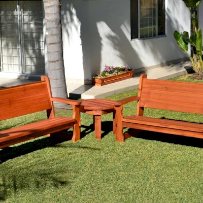 Angel's Rustic Wood Bench (Options: 6 ft, Mature Redwood, No Cushion, No Engraving, Transparent Premium Sealant) and Round Side Table. Carmel Planter in background. 