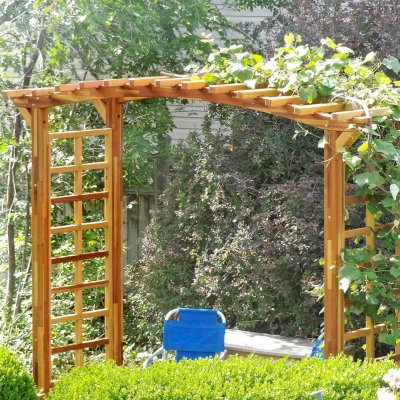 Arched Garden Arbor (Options: 108" W x Custom 48" D, Mosaic Redwood, 4-Post Kit for Concrete, Transparent Premium Sealant). Photo Courtesy of B. Ellis of Salt Lake City, Utah.