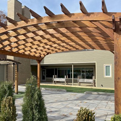 Arched Open Sky Pergolas (Options: 16' L x 20' Arc W, Mature Redwood, No Electrical Wiring Trim, 4-Post Anchor Kit for Concrete, No Ceiling Fan Base, No Privacy Panels, No Curtain Rods, 9.5' Post Height, Transparent Premium Sealant). Photo Courtesy of S. Glancy of Gibsonia, PA.
