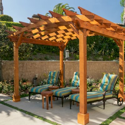 Arched Open Sky PergolaArched Open Sky Pergolas (Options: 11' L x 13' Arc W, Mature Redwood, Unattached, No Electrical Wiring Trim, 4-Post Anchor Kit for Concrete, No Ceiling Fan Base, No Privacy Panels, No Curtain Rods, 9' Post Height, Transparent Premium Sealant). Photo courtesy of G. Gigante of Glendora, CA.