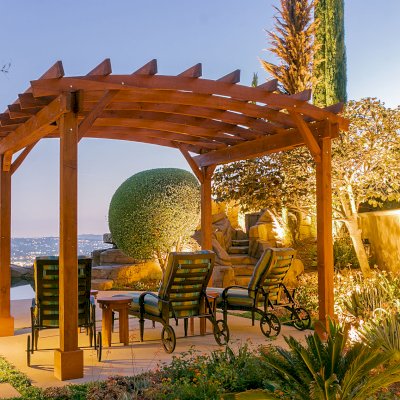 Arched Open Sky PergolaArched Open Sky Pergolas (Options: 11' L x 13' Arc W, Mature Redwood, Unattached, No Electrical Wiring Trim, 4-Post Anchor Kit for Concrete, No Ceiling Fan Base, No Privacy Panels, No Curtain Rods, 9' Post Height, Transparent Premium Sealant). Photo courtesy of G. Gigante of Glendora, CA.