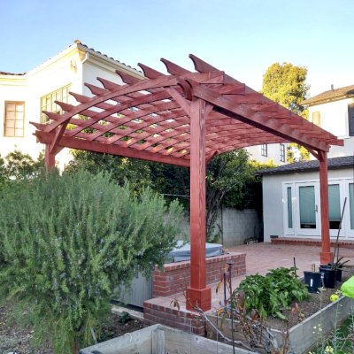 Arched Open Sky Pergolas (Options: 18' L x 15' Arc W, Douglas-fir, 2 Electrical Wiring Trims, 4-Post Anchor Kit for Concrete, No Ceiling Fan Base, No Privacy Panels, No Curtain Rods, 9' Post Height, Custom Stain). Photo Courtesy of K. Jefferson of Santa Monica, CA.