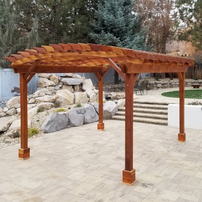 Arched Open Sky Pergolas (Options: 15' L x 14' Arc W, California Redwood, 1 Electrical Wiring Trim, 4-Post Anchor Kit for High-Wind, 1 Ceiling Fan Base, No Privacy Panels, No Curtain Rods, 9' Post Height, Transparent Premium Sealant). Photo Courtesy of D. Cozzi of Reno, Nevada.