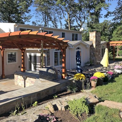 Arched Open Sky Pergolas (Options: 14' L x 12 Arc W & 24' L x 15' W, California Redwood, No Electrical Wiring Trim, No Decorative Trims on Posts, 4-Post Anchor Kit for Concrete, No Ceiling Fan Base, No Privacy Panels, No Curtain Rods, 9.5' Post Height, Transparent Premium Sealant). Photo Courtesy of M. Burke of BukleSomerset, NJ.