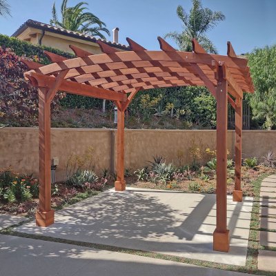 Arched Open Sky PergolaArched Open Sky Pergolas (Options: 11' L x 13' Arc W, Mature Redwood, Unattached, No Electrical Wiring Trim, 4-Post Anchor Kit for Concrete, No Ceiling Fan Base, No Privacy Panels, No Curtain Rods, 9' Post Height, Transparent Premium Sealant). Photo courtesy of G. Gigante of Glendora, CA.