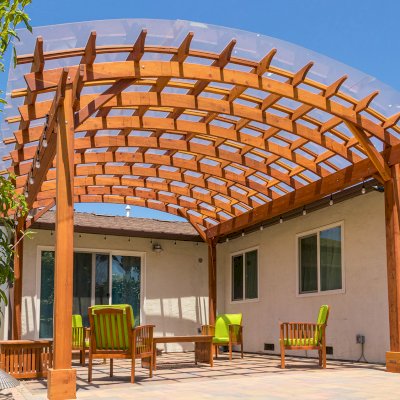 Arched Open Sky Pergolas (Options: 18' L x 16' Arc W, California Redwood, with Rain Guard, Electrical Wiring Trim for All Posts, 4-Post Anchor Kit for Concrete, No Ceiling Fan Base, No Privacy Panels, No Curtain Rods, 9.5' Post Height, Transparent Premium Sealant).
