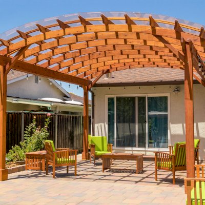 Arched Open Sky Pergolas (Options: 18' L x 16' Arc W, California Redwood, with Rain Guard, Electrical Wiring Trim for All Posts, 4-Post Anchor Kit for Concrete, No Ceiling Fan Base, No Privacy Panels, No Curtain Rods, 9.5' Post Height, Transparent Premium Sealant).