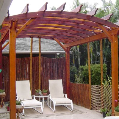 Arched Open Sky Pergolas (Options: 14' L x 12' Arc W, California Redwood, Unattached, No Electrical Wiring Trim, Arched Roof without Lattice Panels, 4-Post Anchor Kit for Stone, No Ceiling Fan Base, No Privacy Panels, No Curtain Rods, 9' Post Height, Transparent Premium Sealant). Photo courtesy of Jeff Bigler of Wailuku, HI.