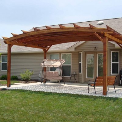 Arched Pergola Kits (Options: 14' L x 20' Arc W, California Redwood, No Electrical Wiring Trim, 4-Post Anchor Kit for Stone, No Ceiling Fan Base, No Privacy Panels, No Curtain Rods, 9' Post Height, Transparent Premium Sealant). Photo Courtesy of Mr. Jeff R. of Beaver Creek, Ohio.