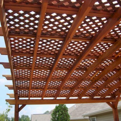 Arched Pergola Kits (Options: 14' L  x 20' Arc W, California Redwood, No Electrical Wiring Trim, 4-Post Anchor Kit for Stone, No Ceiling Fan Base, No Privacy Panels, No Curtain Rods, 9' Post Height, Transparent Premium Sealant). Photo Courtesy of Mr. Jeff R. of Beaver Creek, Ohio. 