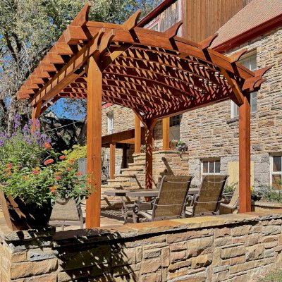 Arched Pergola Kit (Options: 12' L x 12' Arc W, No Privacy Panels, Mature Redwood, No Electrical Wiring Trims, No Ceiling Fan Base, No Curtain Rod, No Privacy Panel, Transparent Premium Sealant). Photo Courtesy of L. Howard of Nashville, TN.