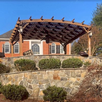 Arched Pergola Kit (Options: 12' L x 16' Arc W, No Privacy Panels, Mature Redwood, No Electrical Wiring Trims, 1 Ceiling Fan Base, No Curtain Rod, No Privacy Panel, Transparent Premium Sealant). Photo Taken 3 Years After Installation. Photo Courtesy of S. Fairbanks of Potomac, MD.