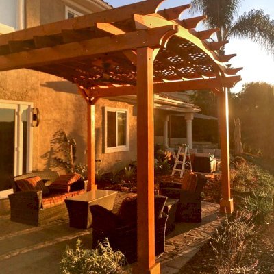 Arched Pergola Kit (Options: 14' L x 14' Arc W, Douglas-fir, 1 Electrical Wiring Trim Kits, 4-Post Anchor Kit for Concrete, 1 Ceiling Fan Bases, No Privacy Panels, No Curtain Rods, 9.5' Post Height, Transparent Premium Sealant). Photo Courtesy of D. Bissember of Escondido, CA.