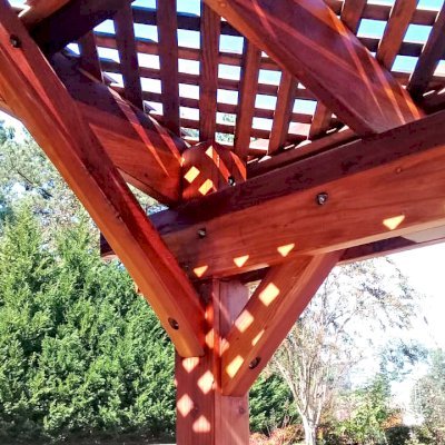 Arched Pergola Kit (Options: 16' L x 18' Arc W, California Redwood, Electrical Wiring Trim Kit for 1 Post, 4-Post Anchor Kit for Concrete, No Ceiling Fan Base, No Privacy Panels, No Curtain Rods, 9' Post Height, Transparent Premium Sealant). Photo Courtesy of C. Klerk of Douglasville, Georgia.