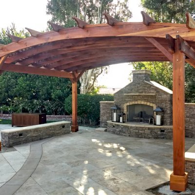 Arched Pergola Kit (Options: 12' L x 18' Arc W, California Redwood, No Electrical Wiring Trim Kit, 4-Post Anchor Kit for Concrete, No Ceiling Fan Bases, No Privacy Panels, No Curtain Rods, 9.5' Post Height, Transparent Premium Sealant). Photo Courtesy of D. Jarvis of Orange, CA.