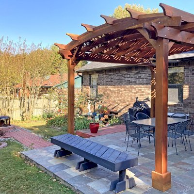 Arched Pergola Kits (Options: 14' L x 12' Arc W, California Redwood, 2 Electrical Wiring Trims, 4-Post Anchor Kit for Concrete, 1 Ceiling Fan Base, No Privacy Panels, No Curtain Rods, Transparent Premium Sealant). Photo Courtesy of J. Treadway of Fayetteville, Arkansas.