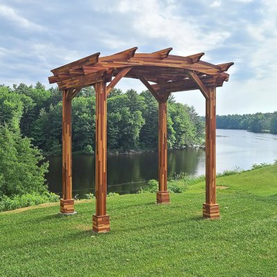 Arched Pergola Kit (Options: 8' L x 10' Arc W, Mosaic Redwood, No Electrical Wiring Trim Kits, 4-Post Anchor Kit for Concrete, No Ceiling Fan Bases, No Privacy Panels, No Curtain Rods, 9' Post Height, Transparent Premium Sealant). Photo Courtesy of Bullseye Golf Club Located at 2800 Ridgewood Trail, Wisconsin Rapids, WI 54494.
