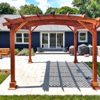 Arched Pergola Kit (Options: 14' L x 14' Arc W, California Redwood, Electrical Wiring Trim Kit for 1 Post, 4-Post Anchor Kit for Concrete, 1 Ceiling Fan Base, No Privacy Panels, No Curtain Rods, 9.5' Post Height, Transparent Premium Sealant). Photo Courtesy of K. Murray of Grand Rapids, Michigan.