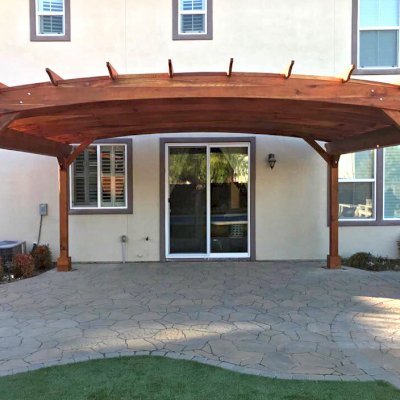 Arched Pergola Kit (Options: 15' L x 20' Arc W, California Redwood, Electrical Wiring Trim Kit for 1 Post, 4-Post Anchor Kit for Concrete, No Ceiling Fan Base, No Privacy Panels, No Curtain Rods, 9' Post Height, Transparent Premium Sealant). Photo Courtesy of Myron Lee of Danville, CA.