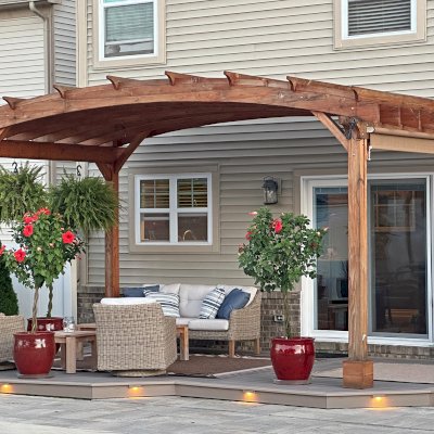 Arched Pergola Kits (Options: 10' L x 18' Arc W, Douglas-Fir, Electrical Wiring Trim for 2 Posts, Post Anchor Kit for High Wind, No Ceiling Fan Base, No Privacy Panels, No Curtain Rods, 10.5' Post Height, Transparent Premium Sealant). Photo Taken 1 Year After Installation. Photo Courtesy of S. Bono of Royal Oak, MI.