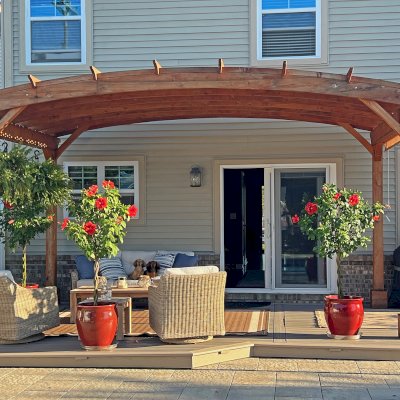 Arched Pergola Kits (Options: 10' L x 18' Arc W, Douglas-Fir, Electrical Wiring Trim for 2 Posts, Post Anchor Kit for High Wind, No Ceiling Fan Base, No Privacy Panels, No Curtain Rods, 10.5' Post Height, Transparent Premium Sealant). Photo Taken 1 Year After Installation. Photo Courtesy of S. Bono of Royal Oak, MI.