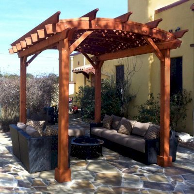 Arched Pergola Kits (Options: 12' L x 10' Arc W, California Redwood, No Electrical Wiring Trim, 4-Post Anchor Kit for Stone, No Ceiling Fan Base, No Privacy Panels, No Curtain Rods, 9' Post Height, Transparent Premium Sealant). Photo courtesy of Mr. Buzz Park of Spring Branch, Texas. 