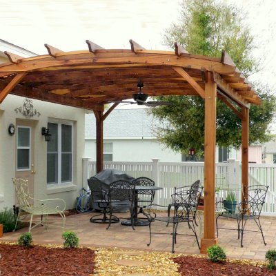 Arched Pergola Kits (Options: 18' L x 15' Arc W, California Redwood, No Electrical Wiring Trim, 4-Post Anchor Kit for Stone, Ceiling Fan Base, No Privacy Panels, No Curtain Rods, 9'  Post Height, Transparent Premium Sealant). Photo Courtesy of Bob Lilys of Central Florida.