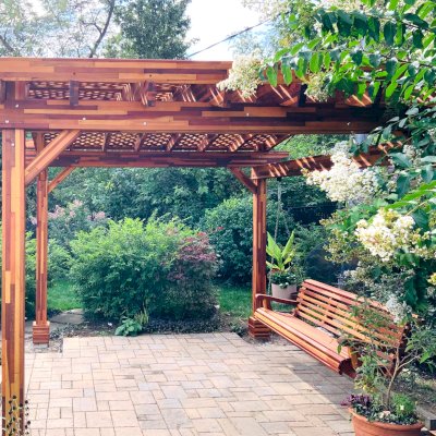 Arched Pergola Kit (Options: 12.5' L x 14' Arc W, Mosaic Redwood, No Electrical Wiring Trim Kit, No Fan Base, No Privacy Panels, Transparent Premium Sealant). Photo Also Shows a XL Bench Swing, Ensenada Style. Photo Courtesy of D. Doty of Bowie, NY.