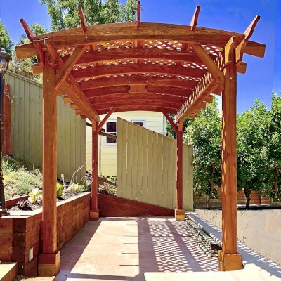 Arched Pergola Kit (Options: 16' L x 10' Arc W, California Redwood, Electrical Wiring Trim Kit for 1 Post, 4-Post Anchor Kit for Concrete, 1 Ceiling Fan Base, No Privacy Panels, No Curtain Rods, 9' Post Height, Transparent Premium Sealant). Photo Courtesy of D. Barreras of South Pasadena, CA.