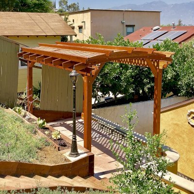 Arched Pergola Kit (Options: 16' L x 10' Arc W, California Redwood, Electrical Wiring Trim Kit for 1 Post, 4-Post Anchor Kit for Concrete, 1 Ceiling Fan Base, No Privacy Panels, No Curtain Rods, 9' Post Height, Transparent Premium Sealant). Photo Courtesy of D. Barreras of South Pasadena, CA.