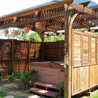 Arched Pergola Kits (Options: 16' L x 14' Arc W, California Redwood, 2 Post Electrical Wiring Trim, 4-Post Anchor Kit for Stone, No Ceiling Fan Base, 3 Shutter Privacy Panels half height with Wall [Custom Lexan Roofing for Additional Privacy and Water Protection. If you are interested in either of these custom details, let us know.], No Curtain Rods, 9' Post Height,Transparent Premium Sealant. Photo courtesy of Ms. Debbie C, Costa Mesa, CA.