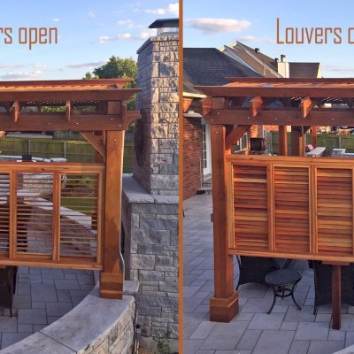 Arched Pergola Kit (Options: 12' L x 12' Arc W, California Redwood, No Electrical Wiring Trim, 4-Post Anchor Kit for Concrete, 1 Ceiling Fan Base, 1 Louver Privacy Panel, No Curtain Rods, Transparent Premium Sealant, 2 Posts Wrapped in Masonry, 8 x 8 Posts by Custom Request). Photo Courtesy of S. Hunter of Fort Smith, AR.
