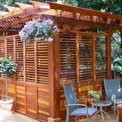 Arched Pergola Kits (Options: 16' L x 14' Arc W, With Wall Panel Louver Style, California Redwood, No Electrical Wiring Trim, 4-Post Anchor Kit for Stone, No Ceiling Fan Base, Privacy Panels, No Curtain Rods, 9' Post Height, Transparent Premium Sealant). Photo Courtesy of George Jackson of Commerce Township,  Michigan.