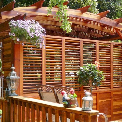 Arched Pergola Kits (Options: 16' L x 14' Arc W, With Wall Panel Louver Style, California Redwood, No Electrical Wiring Trim, 4-Post Anchor Kit for Stone, No Ceiling Fan Base, Privacy Panels, No Curtain Rods, 9' Post Height, Transparent Premium Sealant). Photo Courtesy of George Jackson of Commerce Township,  Michigan.