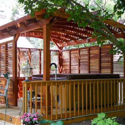 Arched Pergola Kits (Options: 16' L x 14' Arc W, With Wall Panel Louver Style, California Redwood, No Electrical Wiring Trim, 4-Post Anchor Kit for Stone, No Ceiling Fan Base, Privacy Panels, No Curtain Rods, 9' Post Height, Transparent Premium Sealant). Photo Courtesy of George Jackson of Commerce Township,  Michigan.