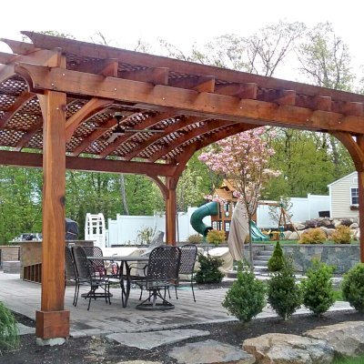 Arched Pergola Kit (Options: 18' L x 20' Arc W, California Redwood, Electrical Wiring Trim for 2 Posts, 4-Post Anchor Kit for High-Wind, 1 Ceiling Fan Base, No Privacy Panels, No Curtain Rods, 9.5' Post Height, Transparent Premium Sealant). Photo Courtesy of P. Cannistraci of Peabody, MA.