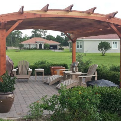 Arched Pergola Kits (Options: 16' L x 14' Arc W, California Redwood, No Electrical Wiring Trim, 4-Post Anchor Kit for Stone, No Ceiling Fan Base, No Privacy Panels, No Curtain Rods, 9' Post Height, Transparent Premium Sealant). Photo Courtesy of Scott and Elizabeth Tribbey of Miami, FL.