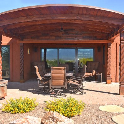 Custom Arched Thick Timber Pavilion (Options: 14' L x 18' Arc W, Douglas-fir, Attached, No Electrical Wiring Trim, No Posts, Pavilion Roof Installed on Existing Load Bearing Columns [Manufactured by https://southwestspiraldesigns.com], No Ceiling Fan Base, No Privacy Panel, No Curtain Rods, 10ft H, Coffee-Stain Premium Sealant). Photo Courtesy of R. Gatz of Green Valley, Arizona.