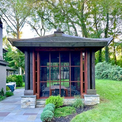 Asian Fusion Pavilion (Options: 22 ft L x 16 ft W, Mature Redwood, 4-Traditional Asian Fusion Anchoring Set, No Electrical Wiring Trim, 10 ft H, No Ceiling Fan, No Privacy Panels, No Curtain Rods, Coffee-Stain Sealant). Custom Screens Added: Customer called 5 years after original order was installed to add screens all around. You can see the different finish between the newly added screens and the original structure.