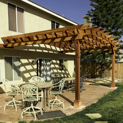 Attached Arched Pergola Kits (Options: 20' L x 15' W, California Redwood, No Electrical Wiring Trim, Arched Roof without Lattice Panels, 2-Post Anchor Kit for Concrete, No Ceiling Fan Base, No Privacy Panels, No Curtain Rods, 10' Post Height, Transparent Premium Sealant). Photo Courtesy of C. Thompson of Corona, CA.
