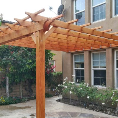 Attached Garden Pergolas (Options: 14' L x 15' W, Attached to Wall by Rafters Side, Douglas-fir, No Electrical Wiring Trim, 2-Post Anchor Kit for High-Wind, Open Roof with Slats at 18", Rafters at 18", No Post Decorative Trims, Transparent Premium Sealant). Photo Courtesy of H. Shang of Irvine, California.