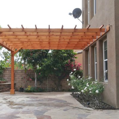 Attached Garden Pergolas (Options: 14' L x 15' W, Attached to Wall by Rafters Side, Douglas-fir, No Electrical Wiring Trim, 2-Post Anchor Kit for High-Wind, Open Roof with Slats at 18", Rafters at 18", No Post Decorative Trims, Transparent Premium Sealant). Photo Courtesy of H. Shang of Irvine, California.