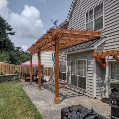 Attached Garden Pergolas (Options: 24'-6" L x 10' W, Attached to Wall by Support Side, Douglas-fir, Electrical Wiring Trim for 1 Post, 2 Ceiling Fan Bases, Open Roof with Slats at 18", with Rain Guard, 3-Post Anchor Kit for Concrete, Sloped Rafters by Custom Request, Transparent Premium Sealant).