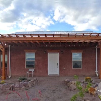 Attached Garden Pergolas (Options: 25' L x 12' W & 25' L x 7' W , Attached to Wall by Support Side, Douglas-fir, No Electrical Wiring Trim, Post Anchor Kit for High-Wind, Open Roof with Slats at 18", Rafters at 18", No Post Decorative Trims, Transparent Premium Sealant). Photo Courtesy of N. Miller of Las Cruces, New Mexico.