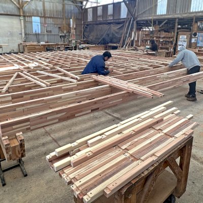 Attached Garden Pergola in Production (Options: 24' x 20', Mosaic Redwood, Flush End Cut Detail).